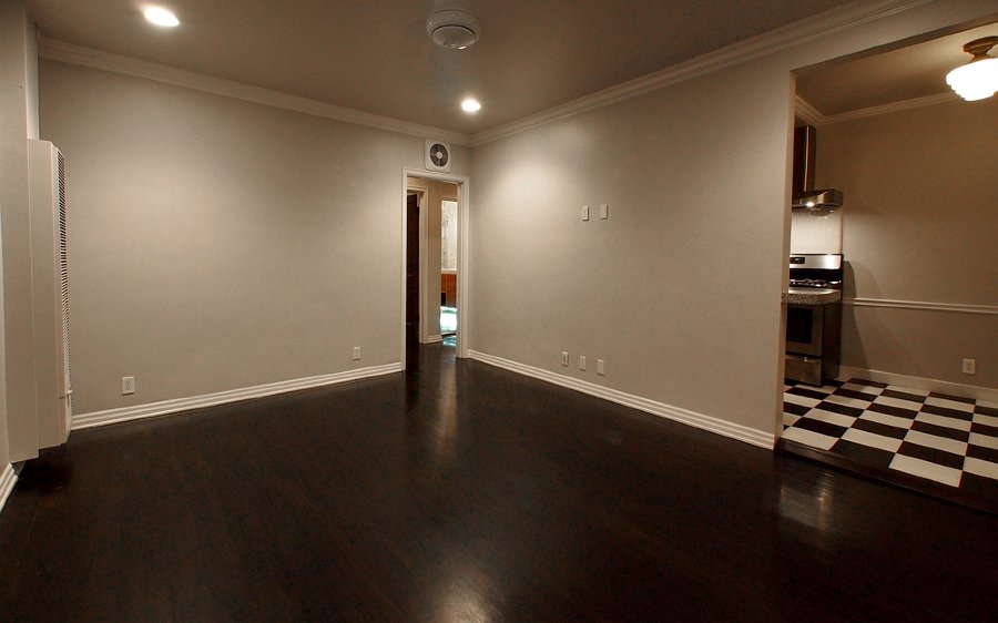 The living room looking toward the hallway and bathroom